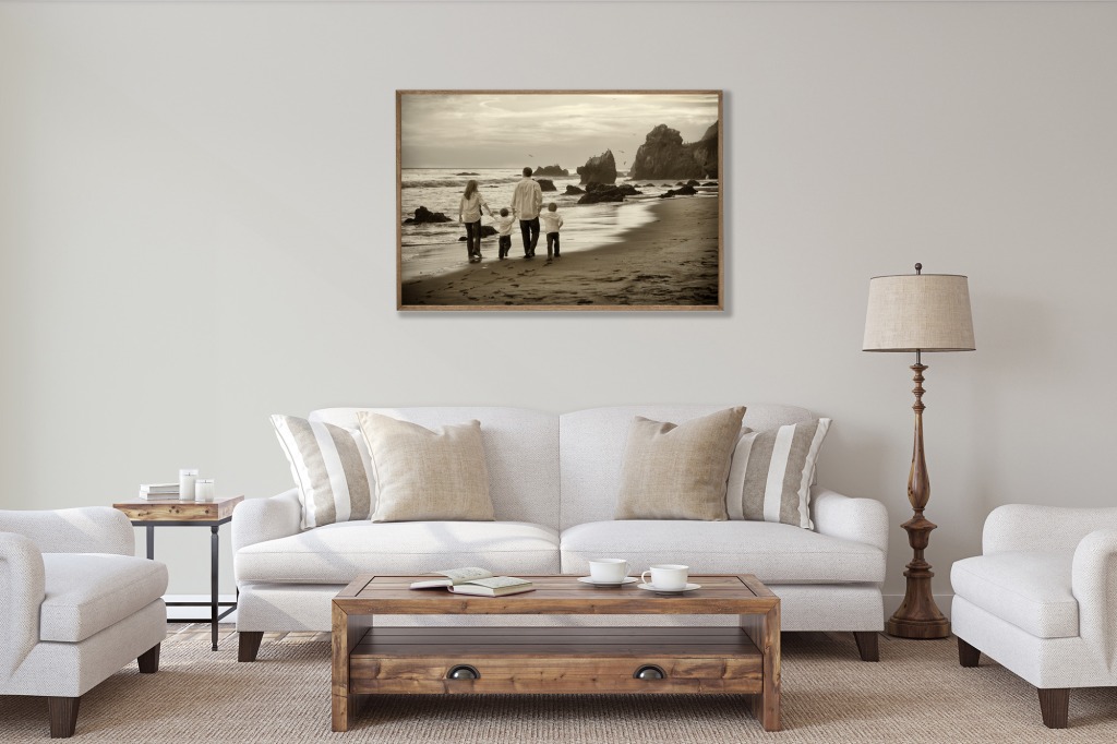 Example of family portrait artwork in canvas framed and hung on living room wall.